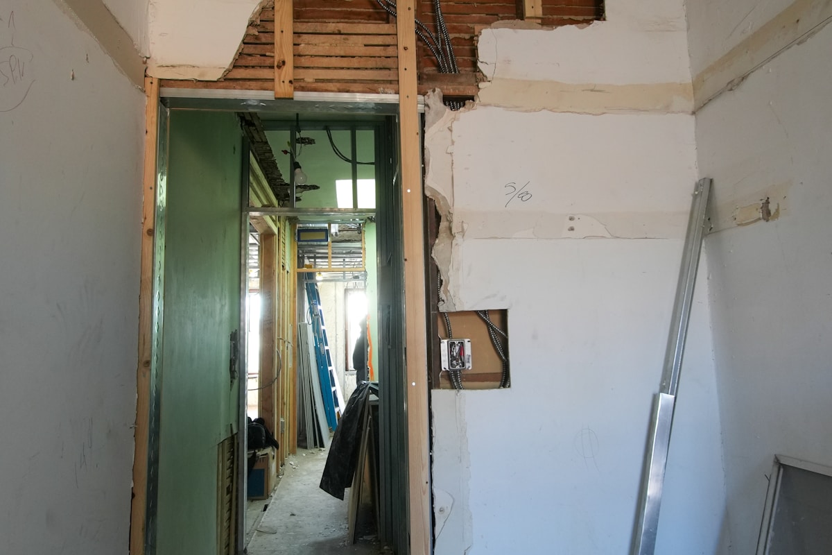 Room stripped to bare walls and floor